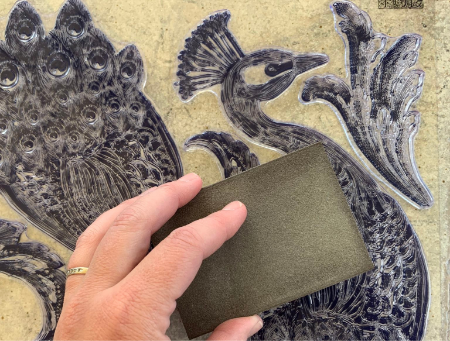 peacock iron orchid design stamp being sanded